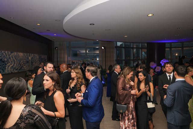 Guests mingling during the BLUE Missions Gala cocktail reception