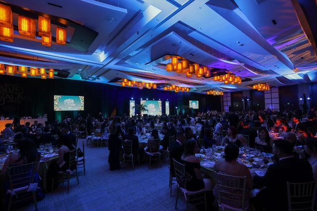 A wide view of the full BLUE Missions Gala ballroom