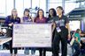Five women holding a Give Miami Day grant check for the Friends of Miami Animals Foundation